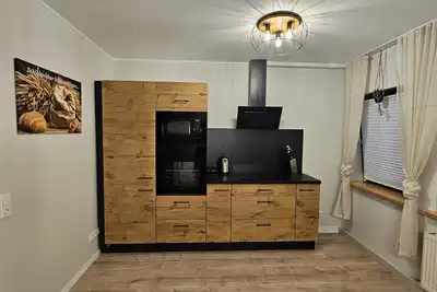 Image de Appartement 'Ferienwohnung An Den Ruhrauen' avec vue sur la montagne et Wi-Fi