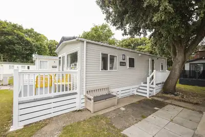 Image de Curlew is a brand new property situated on the boutique Sandhills Holiday Park in Mudeford