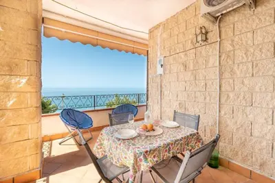 Image de Maison de vacances 'La Casa Sulla Scogliera Grande' avec vue sur la mer, terrasse et climatisation