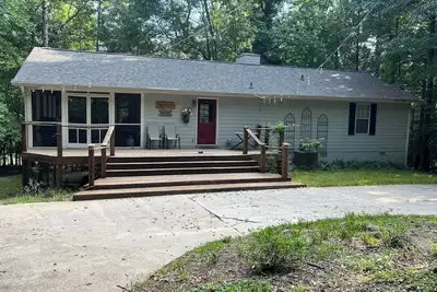 Charming 3-bedroom family cabin on the lake with dock, screened porch, & wi-fi! \n