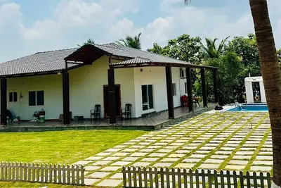 Image de Charming 2-bedroom farmhouse with pool, Ac, in Bibinagar in a 5 acre Mango farm