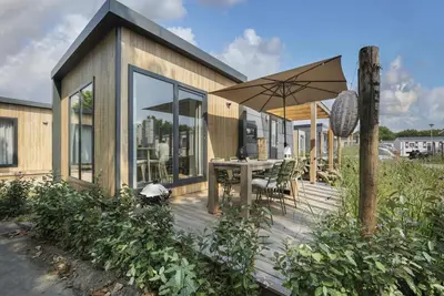 Image de Nice Chalet With air Conditioning, on a Holiday Park, 1 km. From the Beach