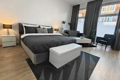 Image de Deluxe Apartment guest room with ensuite bathroom Wismar Center King Bed