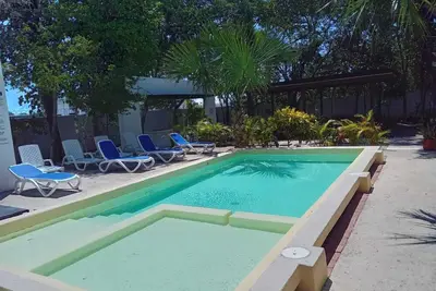 Image de Condo House, next to common area with pool and bbq, and vegetation area