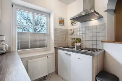 Image de Studio 'Bäckerhus - Ferienwohnung 3' avec terrasse et jardin partagés