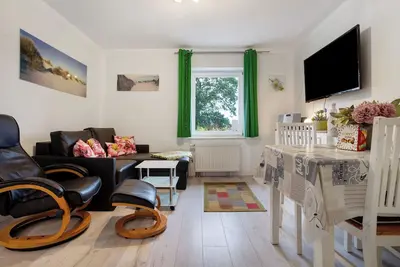 Image de Appartement 'Bäckerhus - Ferienwohnung 6' avec terrasse privée, jardin partagé et Wi-Fi