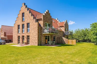 Image de Newly built apartment (80sqm) with balcony directly on the water near Greetsiel!