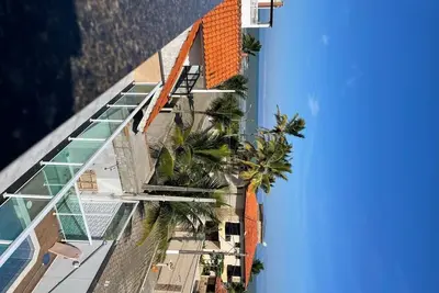 Image de Confortavel Sobrado a 300 Metros da Praia