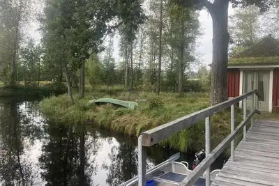 Image de Lovingly furnished holiday home on the river and near the lake, perfect for fishing and relaxing