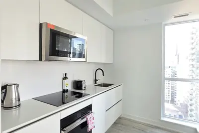 Image de Brand New Condo 3 min walk to Cn Tower. Heart of Toronto ❤️