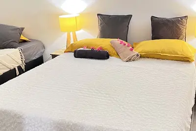 Image de À 5 minutes de la plage! deux logements haut et bas idéal pour des familles