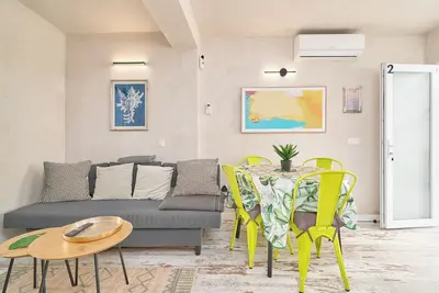Image de Appartement 'Apartamento Familiar 6 Planta Baja' avec terrasse partagée, Wi-Fi et climatisation