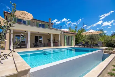 Image de Seafront Villa Marin with a heated pool