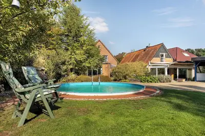 Image de Maison de vacances 'Ferienhaus In Oerrel Mit Pool' avec piscine privée, terrasse privée et Wi-Fi