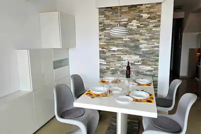 Image de Luxuriöse Zweizimmerwohnung mit Whirlpool, Grill, Privatparkplatz und Meerblick