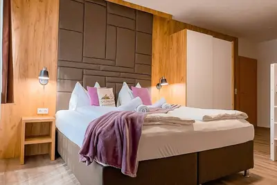 Appartement 'Sylpaulerhof Aparthotel - Deluxe 8' avec vue sur la montagne, piscine partagée et Wi-Fi