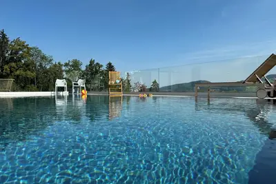 Image de Ferienwohnung 2 mit 2 Schlafzimmer, Priv. Sauna und Traumhaften Salzwasser-pool