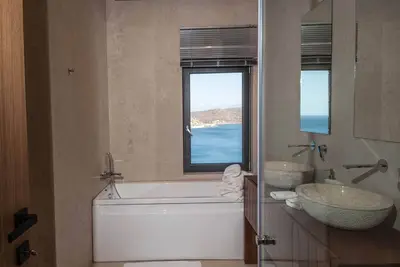 Image de Magnificent Crete Villa | Villa Iris | 6 Bedrooms | Direct Access to Beach | Private Infinity Pool with Breathtaking Sea Views | Outdoor Lounge & Dining Area & Bbq | Fitness Area & Playroom | Elounda