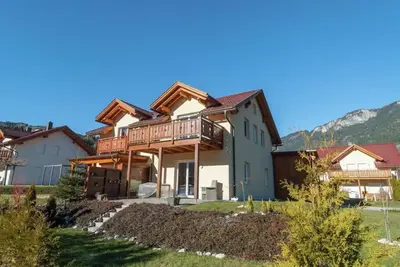 Image de Chalet ski-in ski-out avec jardin