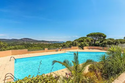 Image de Joli appartement avec Wifi, piscine, climatisation, Tv, terrasse et vue panoramique