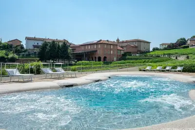 Image de Maison de vacances privée avec Wifi, bain à remous, climatisation, piscine privée, Tv, terrasse