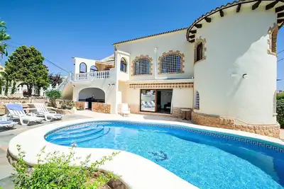 Image de Appartement dans une maison de vacances avec Wifi, climatisation, piscine privée, Tv, patio