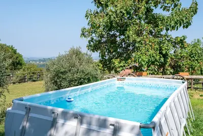 Image de Appartement dans une maison de vacances avec piscine, Wifi, Tv, patio, vue panoramique, parking
