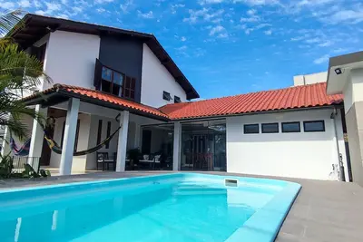Image de Beautiful house, 4 bedrooms, swimming pool, barbecue - Praia da Daniela - Florianópolis