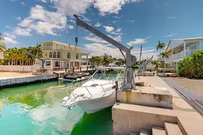 Renovated waterfront duplex with canal access, deck, water views & central Ac