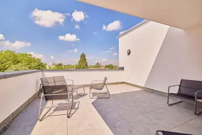 Image de Penthouse apartment in new building with barbecue and Netflix