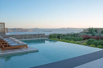 Image de Endearing Mykonos Villa | Villa Riddle | 5 Bedrooms | Breathtaking Sea Views | Spacious Furnished Sun Terrace | Private Outdoor Pool | Bbq Facilities | Shaded Outdoor Dining Area | Private Gym | Agia Sofia, Tourlos Aside