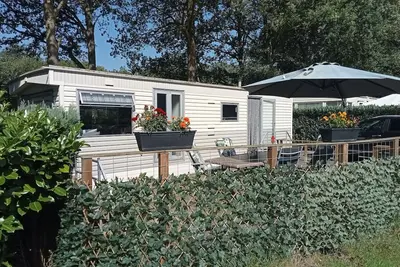 Image de Cozy, mobile home Banjer at camping de Tien Heugten in Schoonloo