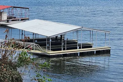 Lakeside, boat dock and hot tub with this snug small cabin.