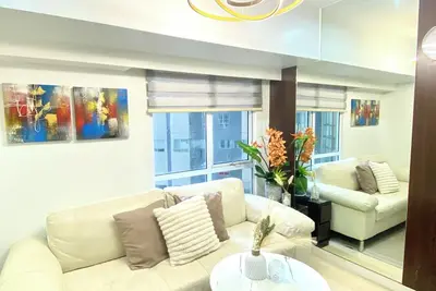 Image de Cozy 2-bedroom condo in charming Bgc Taguig with Ac, WiFi Netflix WashingMachine