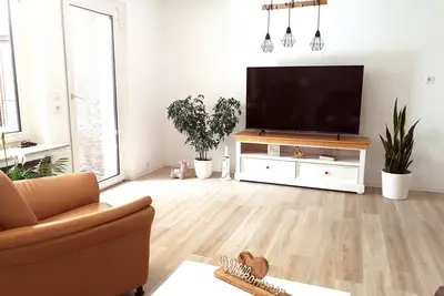 Image de House Meereswind 3xbedroom, conservatory with fireplace, office, on the Westerkaye