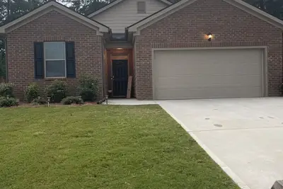 Image de Cozy house in Covington with  3-Bdr. 2bth. Ac and WiFi.