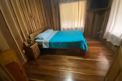 Image de Tranquil 4-bedroom cabin in La Suiza with WiFi