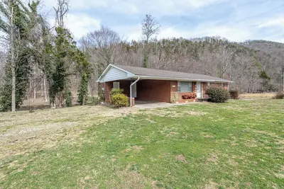 Brick home located on the Little river! Near The Great Smoky Mountains.