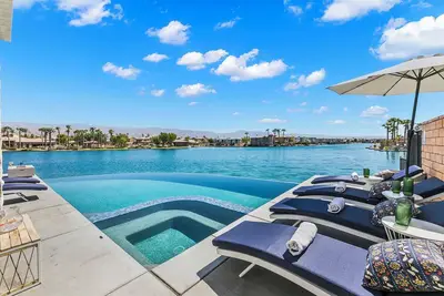 Infinity; Lakefront 5-Bedroom with Infinity Pool, Pet Friendly, & Fun Filled! \n