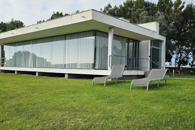 Image de Casa Oliveira, golf e lagoa