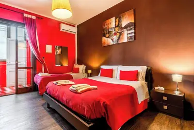 Image de Chambre 'Bnb Sottosopra - Camera Rossa' avec vue sur la mer, Wi-Fi et climatisation