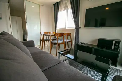 Image de Lovely 3 bdrm for family of 5 people near the beach, pools, fitness and garden