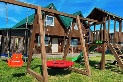 Image de Gandalf - Cozy Two-Story Wooden Cottage for Families with Children
