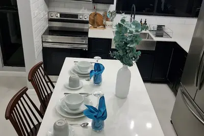 Modern Sunset Oasis - 2bd Apt w/ Pool & Views, 5 Min to Dining & Shopping