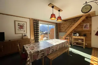 Duplex chaleureux en centre station avec vue sur les pistes