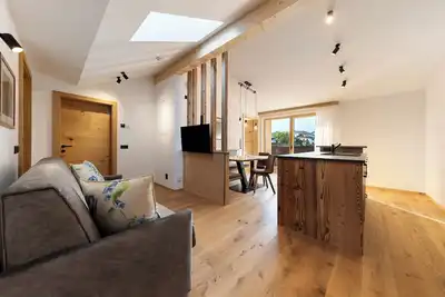 Image de Appartement \"Panorama Loft Dolomites\" avec vue sur les montagnes, terrasse privée et Wi-Fi