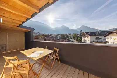 Image de Appartement \"Panorama Loft Meran\" avec vue sur les montagnes, terrasse privée et Wi-Fi