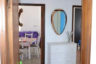 Image de Appartamento 4m près de la plage avec Wi-Fi et balcon