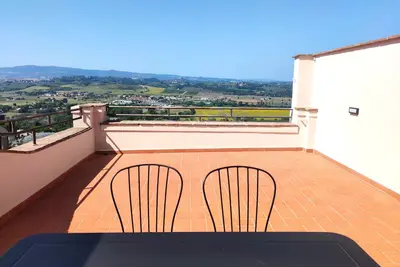 Image de Apartment with large panoramic terrace in the center of the village.