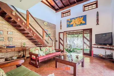 Image de Casa em Ubatuba com área gourmet e acesso ao rio